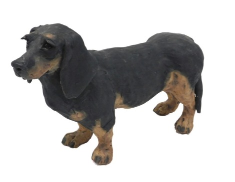 A Julia Hulme studio pottery figure of a Dachshund, signed and dated 2014, 34cm long.