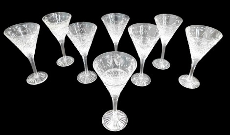 A set of six Stuart cut glass wine glasses, each with a tapering bowl, 31cm high.