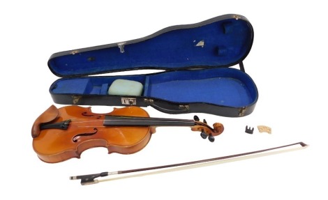 A German violin, bearing label stating Copy of Nicolo Amasi made by Ernst Heinrich Roth, model number C1315, etc., length of back 36cm, and a violin bow, in fitted case.