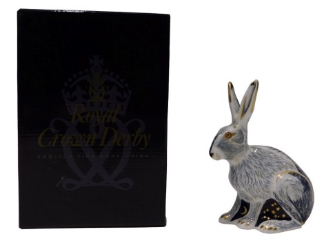 A Royal Crown Derby Collector's Guild paperweight Starlight Hare, gold button to underside, boxed.