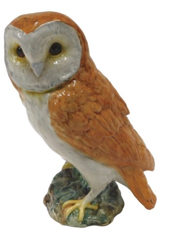 A Beswick owl, impressed mark to underside and numbered 1046, 19cm high.