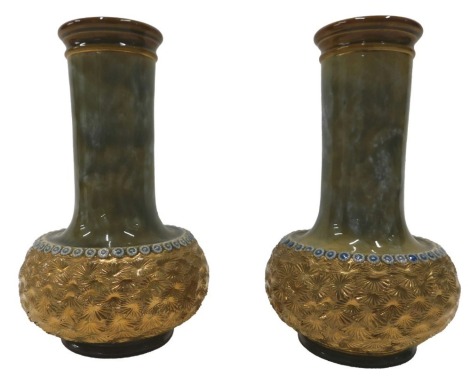 A pair of Royal Doulton vases, each with a mottled green neck and textured gilt base, printed marks to underside, 15cm high.