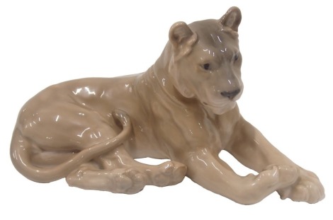 A Royal Copenhagen porcelain figure of a lioness, printed marks in green and handwritten name Bex and numbered 804, 30cm long.