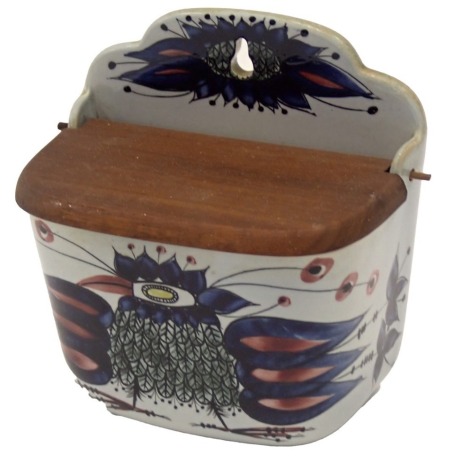 A Royal Copenhagen Fajance salt box, with a teak lid, decorated with stylised bird, printed and impressed mark to reverse, 16cm wide.