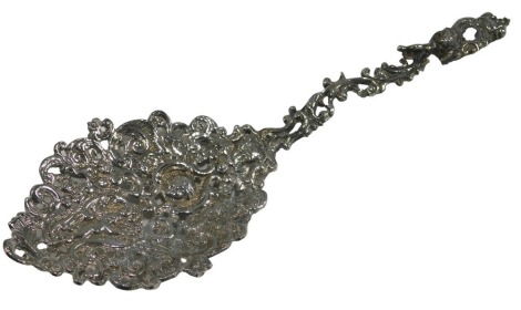 A Continental white metal ornate spoon, decorated with scrolls, masks, putti, etc., possibly Dutch, 1.93oz.