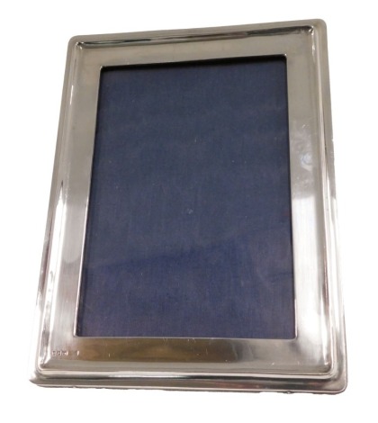 A silver mounted rectangular photograph frame, Sheffield hallmark and stamped 925, 13cm high.