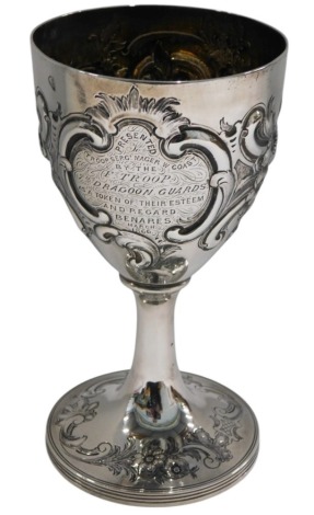 A George III silver goblet or cup, with later embossed scroll decoration, engraved Presented to Troop Sergeant Major W Coast by the F. Troop 7th Dragoon Guards as a Token of Their Esteem and Regard Benares (India) March 1858, London 1798, 7.16oz, 17cm hig