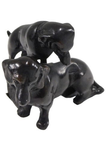 20thC School. Bronze figure of two Dachshunds, 10cm long.