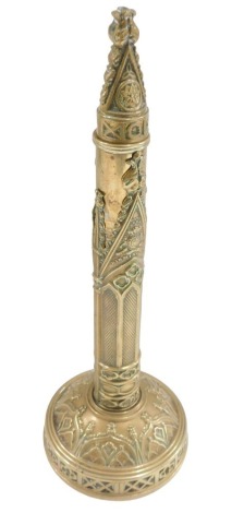 A cast brass Days Patent folding table fan, decorated overall with Gothic arches, etc., lacking fan internally, 23cm high.