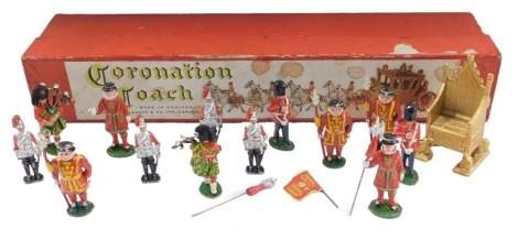 A quantity of painted diecast figures, some stamped Cherilea, a Coronation chair, etc., in Coronation coach box.