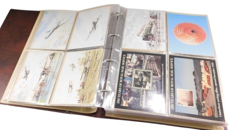 A quantity of coloured real photo postcards, cards relating to transport, Royal commemoratives, etc. (1 album)