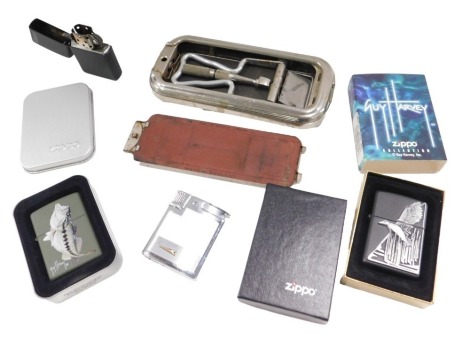 Miscellaneous items, to include a Zippo Guy Harvey Collection collectable lighter, two other Zippo lighters, a Ronson lighter in Art Deco style, and a Rolls razor.