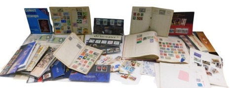 A quantity of stamps, to include stamp album, first day covers, two pound notes, etc.