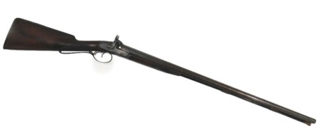 A shotgun, with walnut stock, engraved plate, muzzle loading, 20cm long.