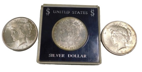 A United States 1883 dollar, a 1924 dollar, and a 1925 dollar. (3)