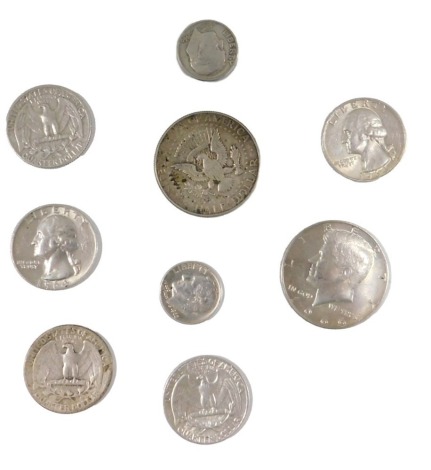 A group of USA silver coinage, to include Liberty dollars, etc., 60g.