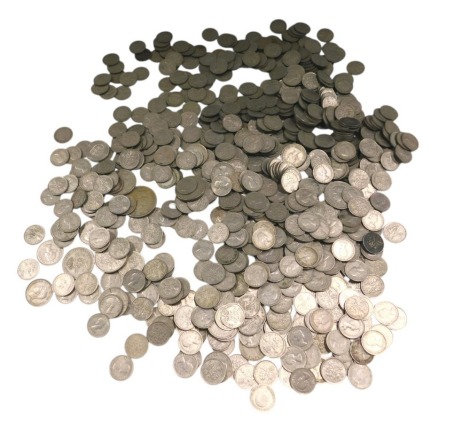 A large quantity of mainly nickel silver sixpences, two shillings, etc.