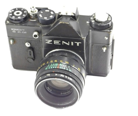 A Zenit TTL camera, with lens.