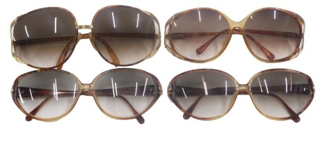 Four pairs of Christian Dior sunglasses, fitted with prescription lenses.