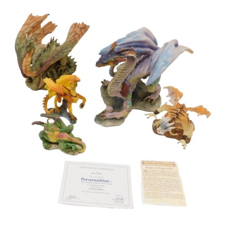 A group of Danbury Mint resin dragon figures, to include Petdvarnathian, 17cm high, etc.