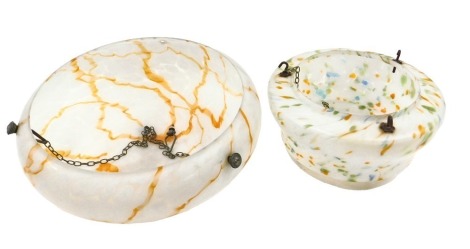 An early 20thC mottled opaque glass ceiling shade or plafonier, 39cm diameter, and another similar, 31cm diameter.