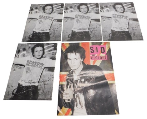 A collection of Sex Pistols related posters, to include four posters issued by Virgin Records, for use in tube stations or on buses, and a Sid Vicious poster used around the same time.