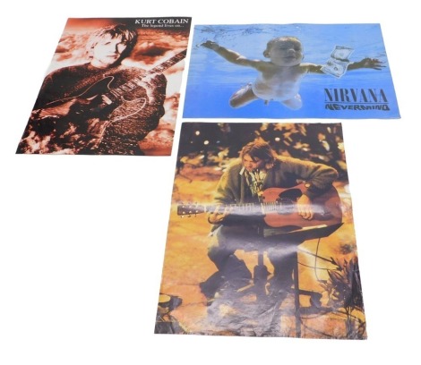 Three Nirvana 1990s music posters.