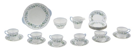 A Shelley 17544 pattern part tea service, decorated with a band of violets, to include six cups, milk jug, sugar bowl.