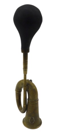 A replica brass Deluxe vintage car horn.