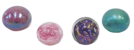 A collection of paperweights, to include a pink and green iridescent examples, further example engraved Albeds, etc. (4)