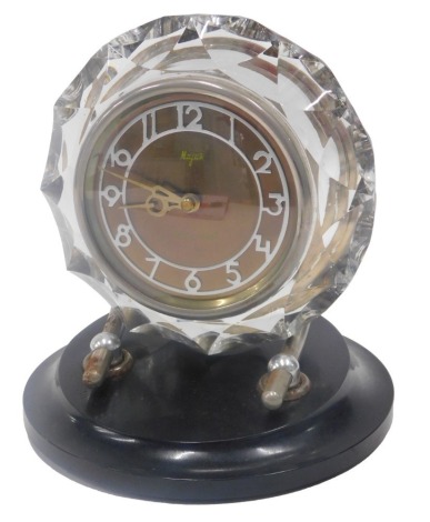 A Majak Russian mantel clock, with glass case, chrome mounts and early plastic base, 20cm high.