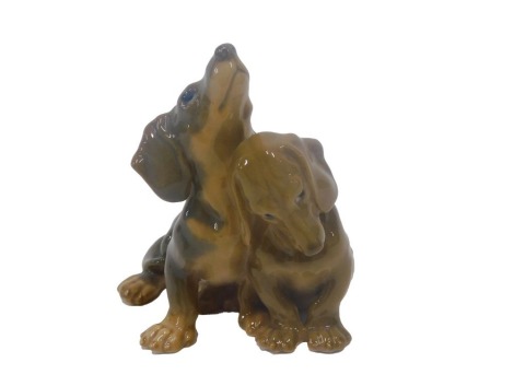 A Bing and Grondahl model of two Dachshunds, numbered 1805, 9cm high.