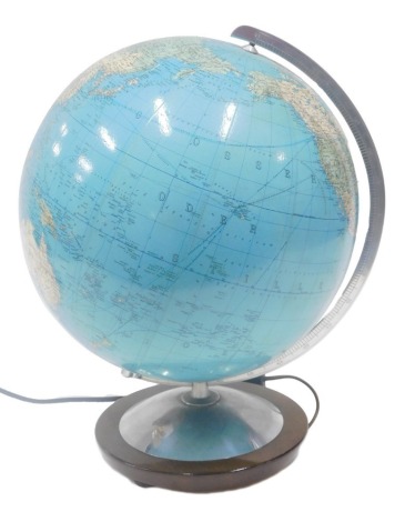 A Columbus Duo Erdglobus globe, with aluminium mounts and wooden base, illuminated, 43cm high. WARNING! This lot contains untested or unsafe electrical items. It is supplied for scrap or re-conditioning only. TRADE ONLY