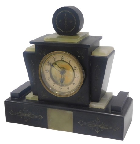 An Art Deco black slate and green onyx mantel clock, the paper dial stamped Made in France, 33cm wide. (AF)