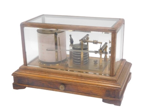 A brass barograph, in glazed oak case with drawer, 36cm wide.