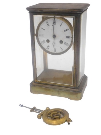 A late 19thC French brass four glass mantel clock, the enamel dial with Roman numerals, 25cm high.