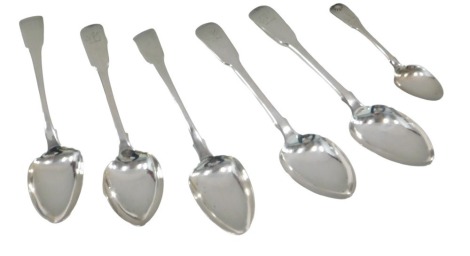 An associated set of five 19thC silver fiddle pattern dessert spoons, 9.68oz, and a silver fiddle pattern teaspoon, 0.65oz.