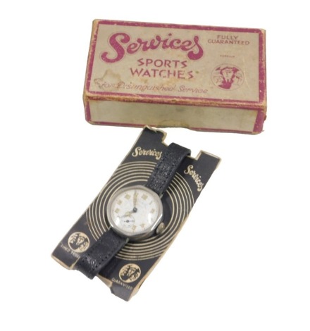 A services wristwatch, with Arabic numerals, in original box and packaging.