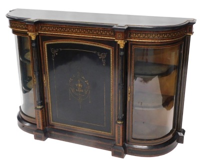 A Victorian ebonised credenza, the top with a moulded edge above a large door with incised gilt decoration, flanked by two curved glass doors enclosing shelves, on a plinth, 97cm high, 152cm wide, 43cm deep.