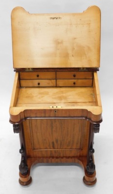 A Victorian mahogany Davenport, the top with a hinged pen and ink section, with pierced brass gallery, the fall with brown leather insert, enclosing a fitted interior, above an arrangement of four drawers to side, and four false drawers, on scrolling supp - 3