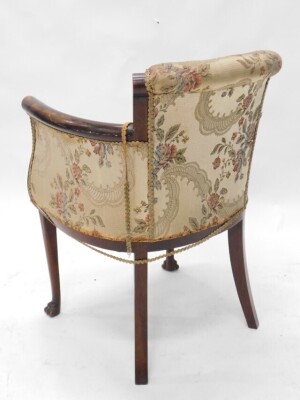 A late 19th/early 20thC mahogany tub chair, with an upholstered padded back, sides and seat, the frame with bell flower carved arm supports, on turned tapering legs, with paw feet. - 2