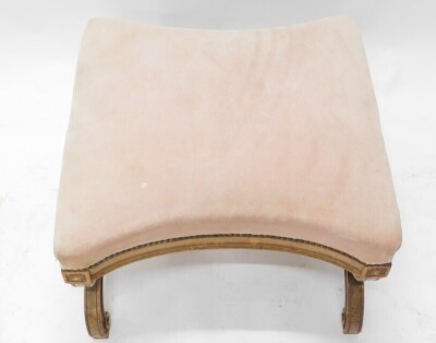 A 19thC walnut stool, with pink upholstered top with concave sides, on moulded x shaped supports, with turned stretcher, from a Duchess Brisee, 43cm high, 61cm wide. - 2