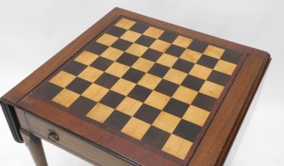 A mahogany drop leaf games table, the rectangular top with reversible lid for chess board, enclosing an interior inlaid for backgammon, above a frieze drawer, on turned tapering legs, with pad feet, possibly 18thC but adapted, 71cm high, 60cm wide. - 2