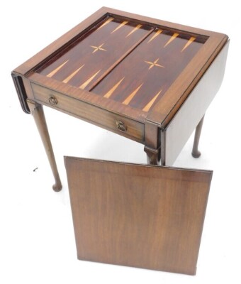 A mahogany drop leaf games table, the rectangular top with reversible lid for chess board, enclosing an interior inlaid for backgammon, above a frieze drawer, on turned tapering legs, with pad feet, possibly 18thC but adapted, 71cm high, 60cm wide. - 3