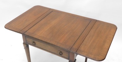 A mahogany drop leaf games table, the rectangular top with reversible lid for chess board, enclosing an interior inlaid for backgammon, above a frieze drawer, on turned tapering legs, with pad feet, possibly 18thC but adapted, 71cm high, 60cm wide. - 4