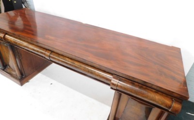 A large Victorian mahogany pedestal sideboard, the top with four cushion shaped frieze drawers, above two pedestals, each with shaped doors, and two cylindrical pillars, on a plinth, 97cm high, 240cm wide, 70cm deep. - 2