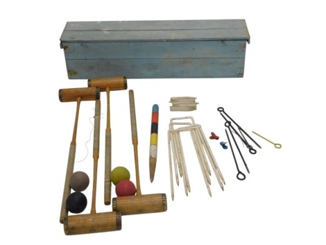 A Jacques type croquet set, in blue painted case, with four mallets, four balls, etc.