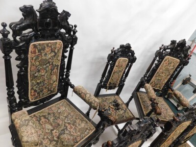 A set of eight late 19th/early 20thC ebonised oak dining chairs, in Caroleon style, each with a high leaf carved back, a padded seat, on fluted turned supports, with H stretcher, two with arms. - 3