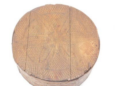 A 19thC Norwegian birch circular box and cover, of pegged construction, with geometric decoration, 220cm high, 46cm diameter. (AF) - 2