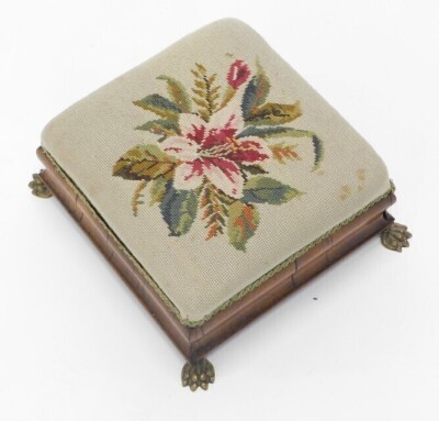 A Victorian rosewood footstool, needlework padded seat, moulded sides and brass paw feet, 36cm wide. - 2